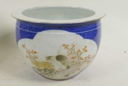 A Chinese blue and white bulbous jar with four angry face mask handles and decorated with birds