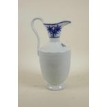 A Chinese blue and white porcelain jug with incised auspicious fruit decoration, 2 character mark to