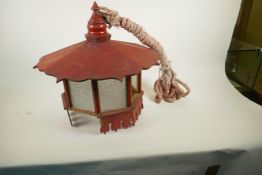 An Oriental painted wood hanging lantern with glass panels, A/F, 18½" diameter