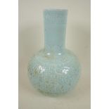 A Chinese duck egg blue porcelain vase with all over under glazed archaic decoration, 13" high