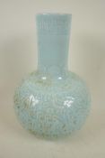 A Chinese duck egg blue porcelain vase with all over under glazed archaic decoration, 13" high