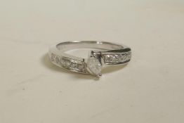 A 9ct white gold diamond dress ring, approximate size 'M/N'