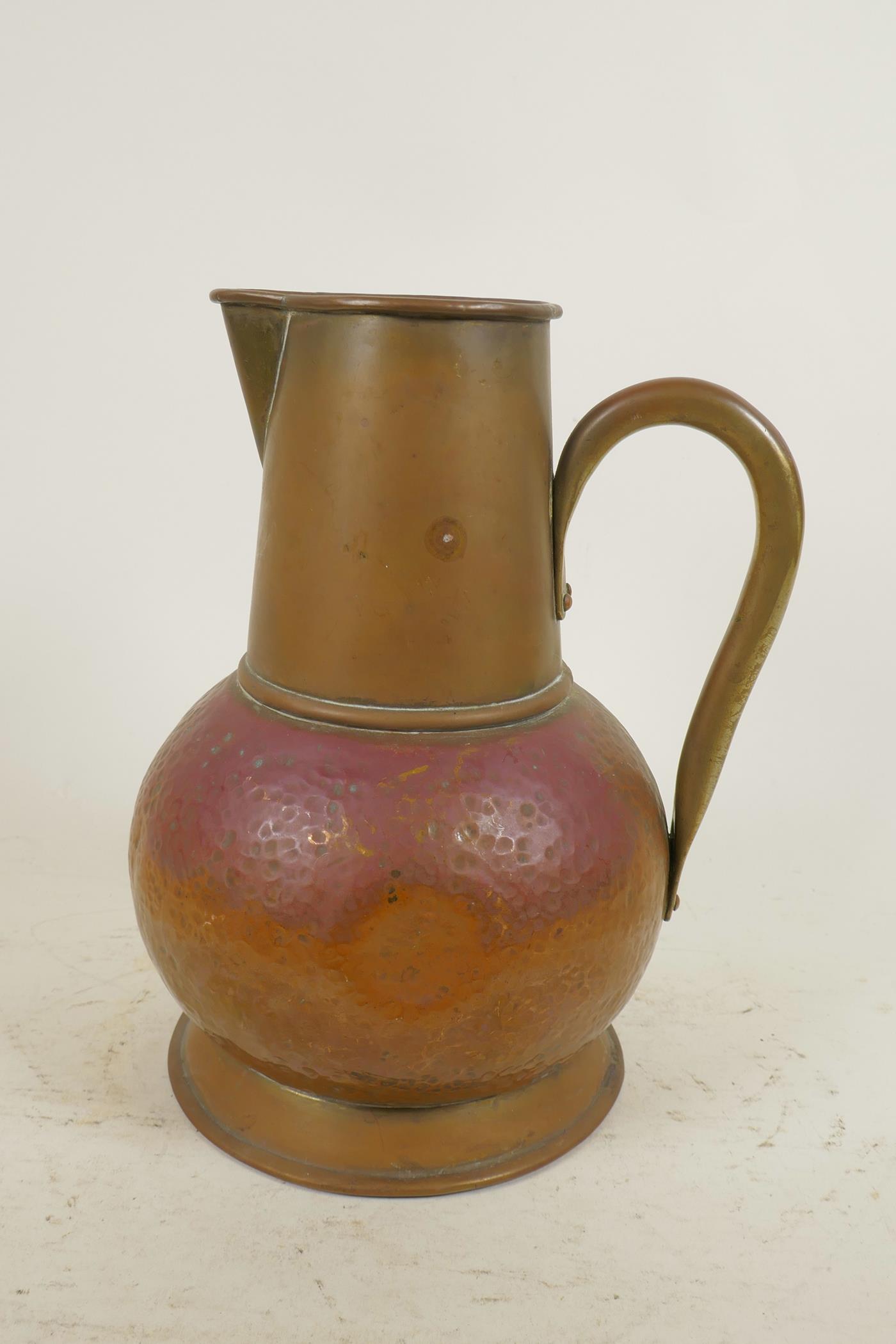 An Arts and Crafts copper jug, together with a coppered metal jelly mould in the form of a fish, - Image 2 of 6