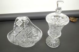 A lead crystal fruit basket, 10" wide, together with a lead crystal sweet jar and cover