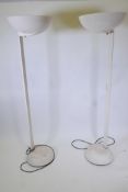 A pair of 1980s 'Thorn Emi-Duy' floor standing uplighters with reeded columns and domed fibreglass