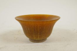 A Chinese faux horn libation cup, 4½" diameter