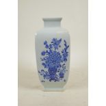 A Chinese blue and white porcelain square shaped vase with decorative panels depicting objects of