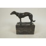 A bronze figure of a Borzoi hound mounted on a marble plinth, 6¼" long
