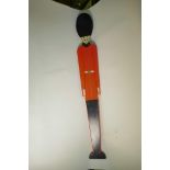 A painted wood height measure in the form of a guard in ceremonial dress including busby, 48" high