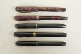 Four Conway Stewart fountain pens and an Esterbrook 'Relief' model 12 fountain pen, all with 14ct