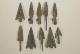 A collection of ten archaic bronze arrowheads, 3½" longest