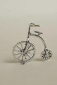 A novelty miniature silver penny farthing, 1"