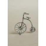 A novelty miniature silver penny farthing, 1"