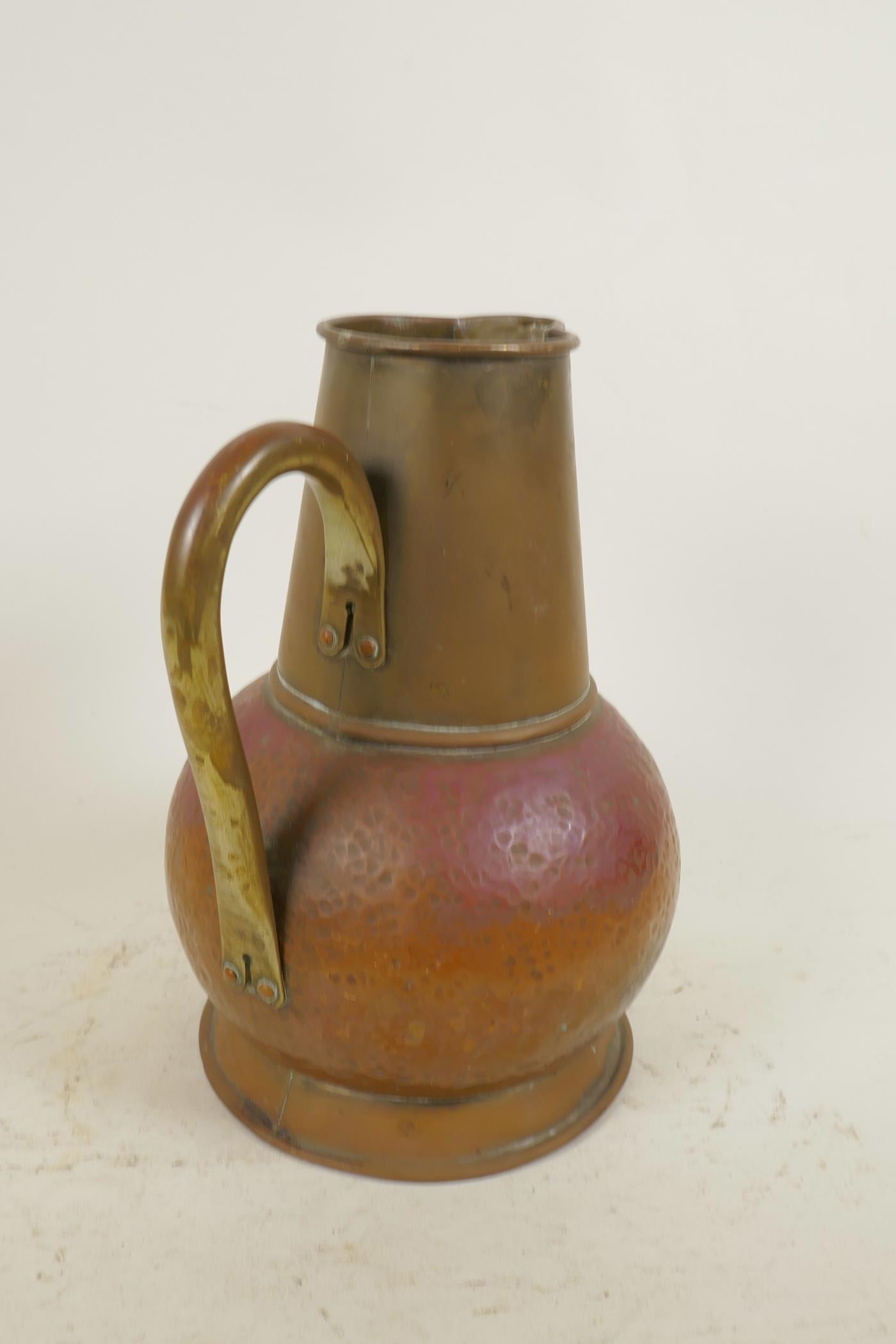 An Arts and Crafts copper jug, together with a coppered metal jelly mould in the form of a fish, - Image 3 of 6