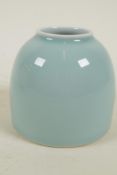 A Chinese duck egg blue glazed porcelain 'Beehive' jar, 3½" high, 6 character mark to base