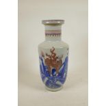 A Chinese blue and white porcelain Rouleau porcelain bottle vase decorated with red kylin in a