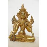 A solid cast gilt bronze figure of Buddha, 4½" high