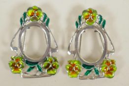 Two miniature silver and enamel photo frames, 1½" long