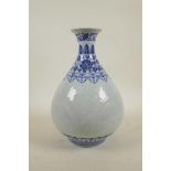 A Chinese blue and white porcelain pear shaped vase decorated with butterflies and flora, 6