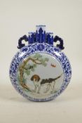 A Chinese blue and white porcelain two handled triple stem moon flask with polychrome decorative