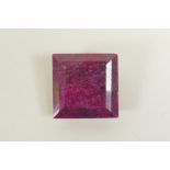 A 215ct natural ruby, square cut, opaque, colour enhanced, certified by Gemological Laboratory of