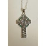 A 925 silver pendant in the form of a Celtic cross, with green stone settings, 2" drop