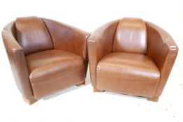 A pair of vintage leather Aviator style tub chairs, 26" high, a/f leather scratched