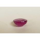 A 4.90ct translucent natural ruby, oval cut, glass filled, colour enhanced, certified, with