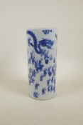 A Chinese blue and white porcelain cylinder vase decorated with 'One Hundred Boys' participating