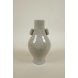 A Chinese crackle glazed porcelain vase with two lug handles, seal mark to base, 9" high