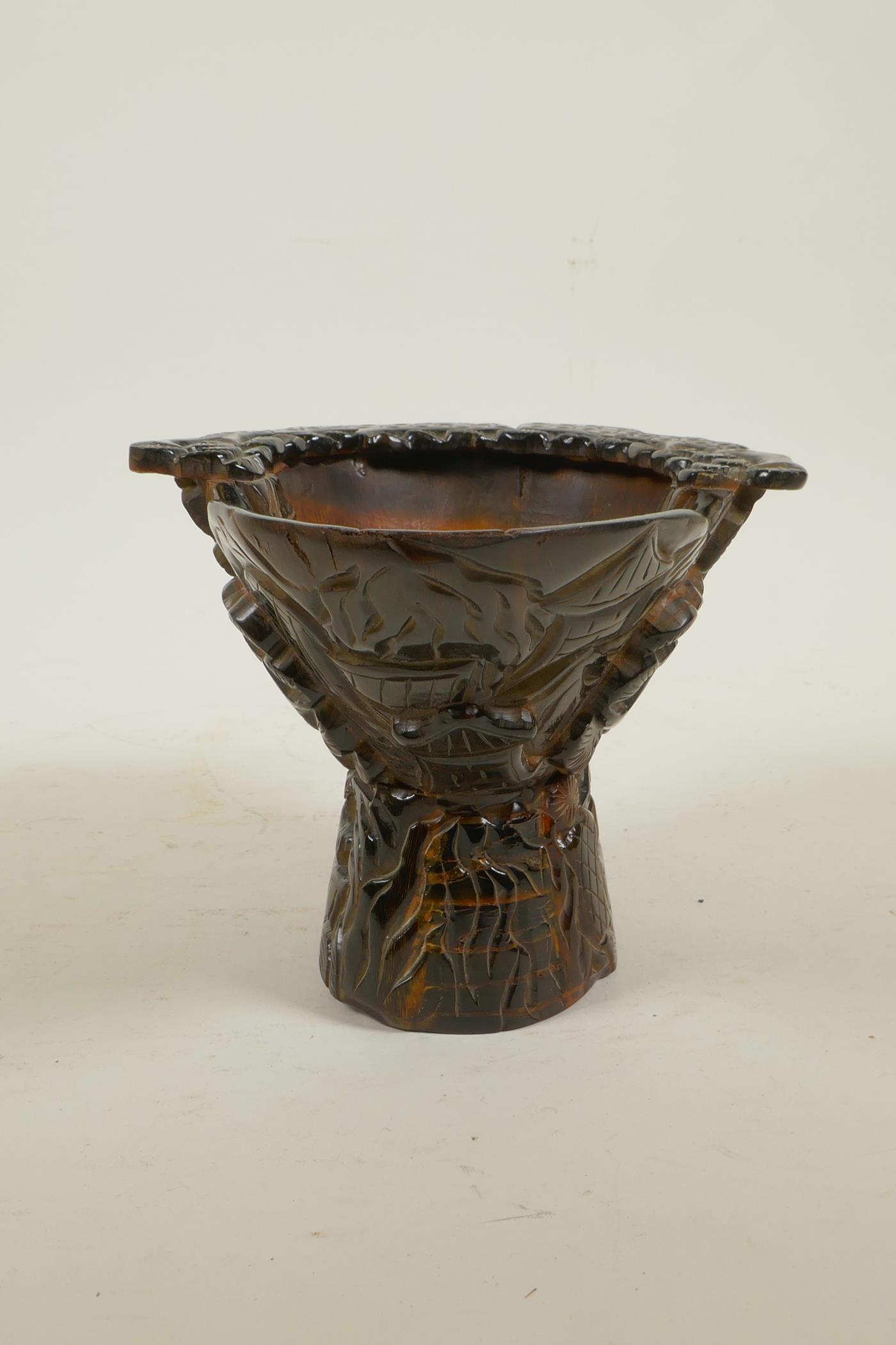 A Chinese sectional horn libation cup with carved decoration of figures in a forest, 4½" high x - Image 2 of 4