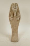 An Egyptian terracotta shabti, 15" high
