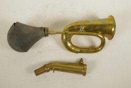 An antique brass car horn, together with a brass petrol pump nozzle/gas can nozzle, 14" long, A/F