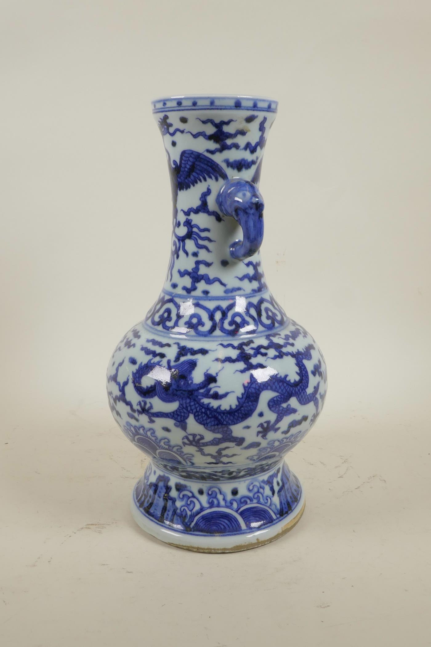 A Chinese Ming style blue and white porcelain two handled vase decorated with dragons and phoenix, 6 - Image 2 of 5