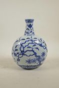 A Chinese Ming style blue and white porcelain moon flask decorated with trees in bloom, 4