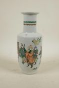 A Chinese famille verte porcelain Rouleau vase decorated with warriors in a landscape, 6 character