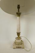 A marble and brass table lamp in the form of a classical column, 21" high