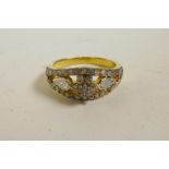 A silver gilt ring encrusted with uncut diamonds and diamond shards