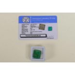 An 18.55ct natural emerald, octagon step cut, colour enhanced, certified by Gemological Laboratory