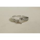 A 9ct white gold diamond dress ring, approximate size 'M/N'