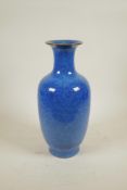 A Chinese mottled blue flambe glazed pottery vase, impressed seal mark to base, 14" high
