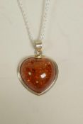 A 925 silver and amber style heart shaped pendant necklace, 1½"