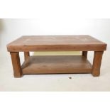A stained pine two tier coffee table, 48½" x 29½", 19½" high