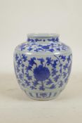 A Chinese blue and white porcelain vase with scrolling floral decoration, 6½" high