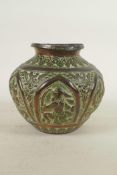 An Indian copper pot with repousse figural decoration, 5" high