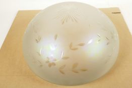 A vintage lustre glass ceiling lamp shade with cut decoration of a star and flowers, 14" diameter