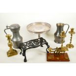 A box of metalwares including cast iron footman, pewter tankards, brass scales etc