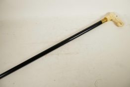 A hardwood walking stick, the bone handle carved as an elephant's head, 33" long