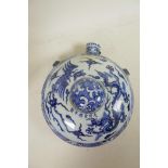 A Chinese blue and white porcelain moon flask decorated with dragons and phoenix, 10" diameter