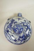 A Chinese blue and white porcelain moon flask decorated with dragons and phoenix, 10" diameter